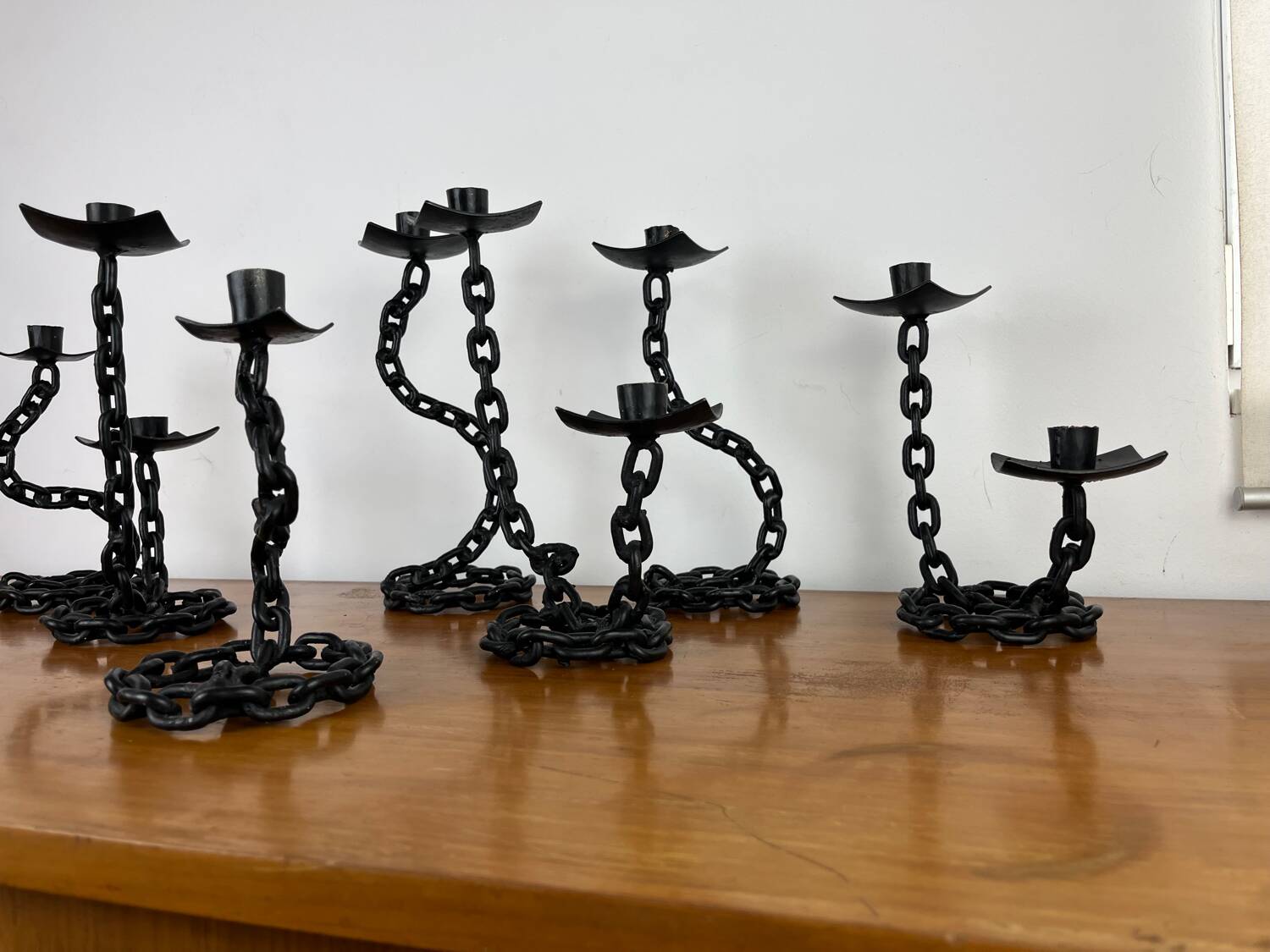 7 wrought iron candle holders in brutalist chain style