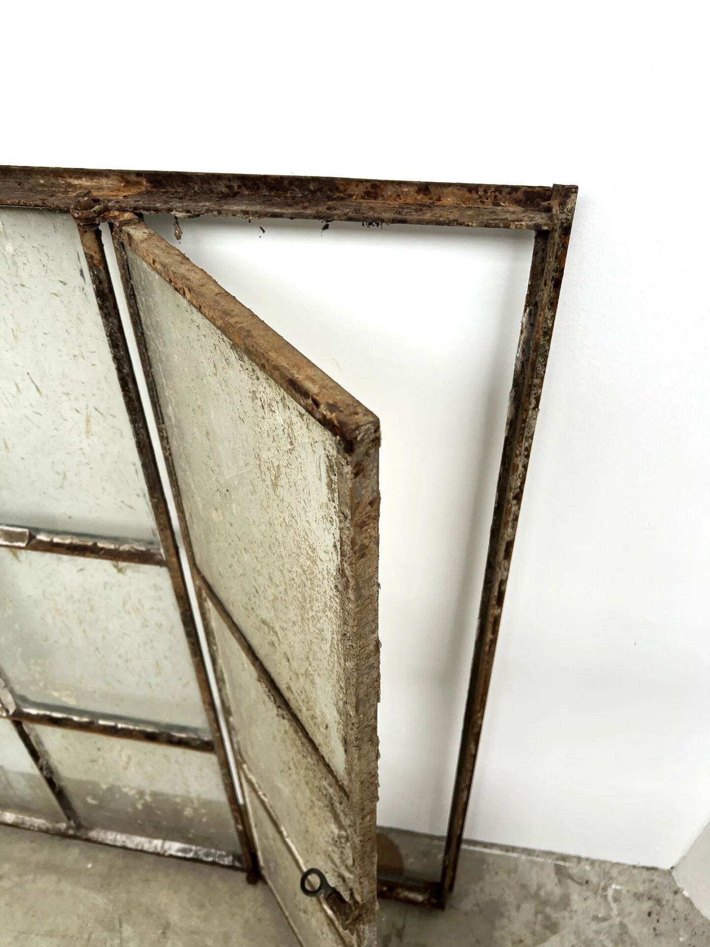 Old steel workshop skylight with opening.