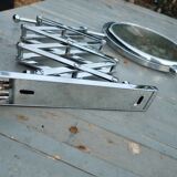 Telescopic magnifying mirror