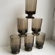 Set of 6 glasses with liqueur in smoked glass design 70s
