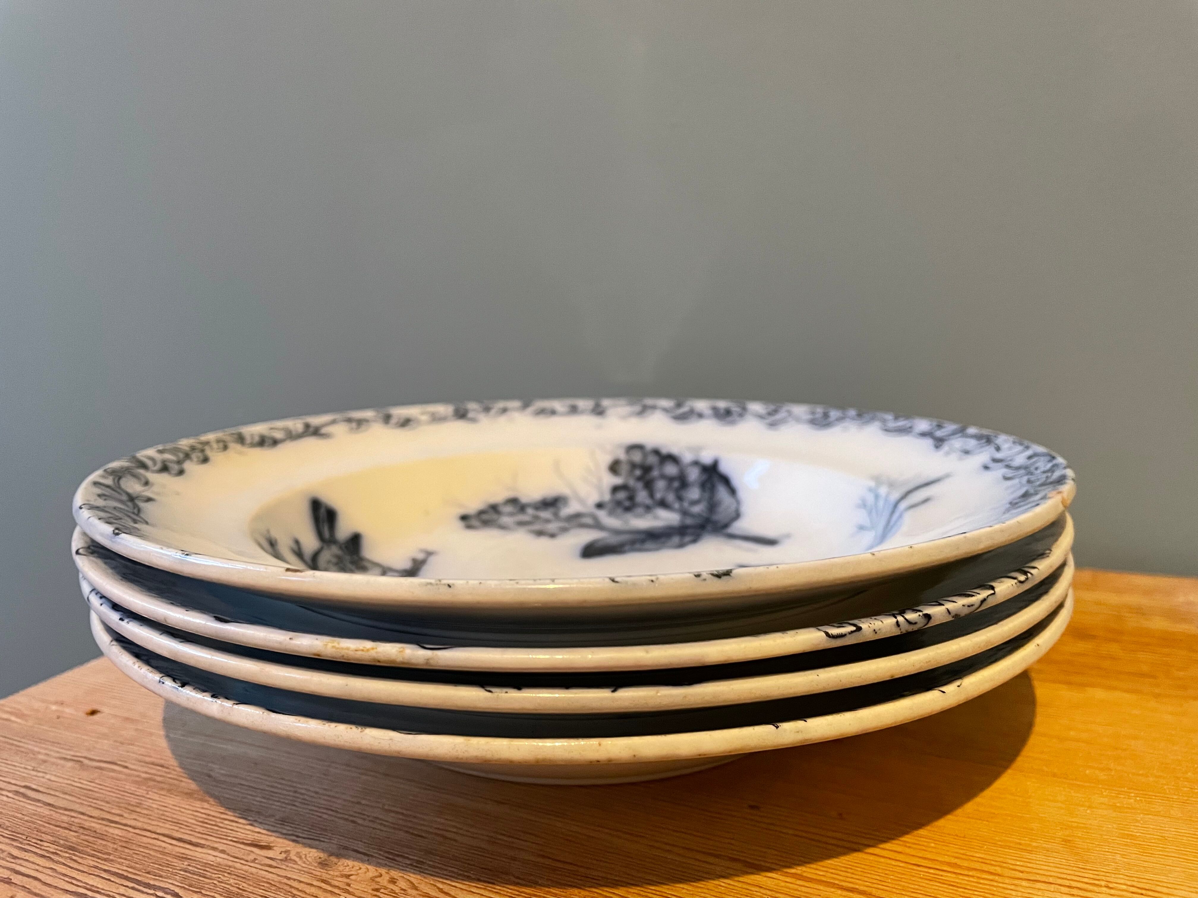 Set of 4 hollow plates Terre de Fer
