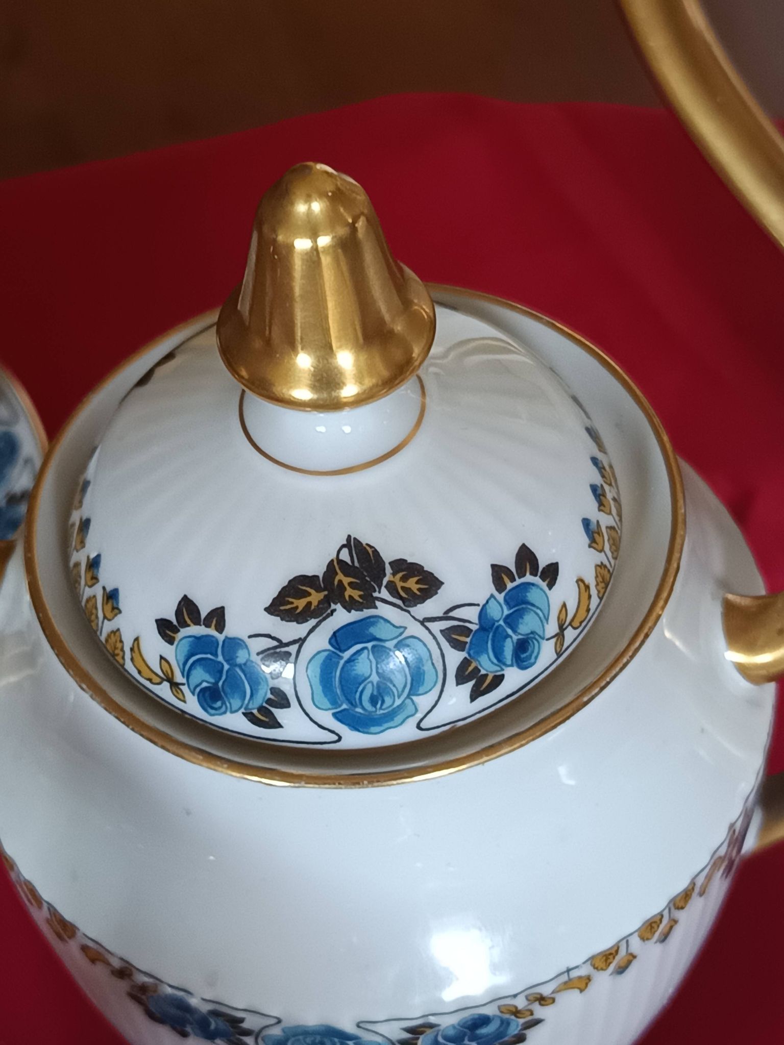 Antique Limoges porcelain coffee/tea service – 14 pieces with blue rose decoration.