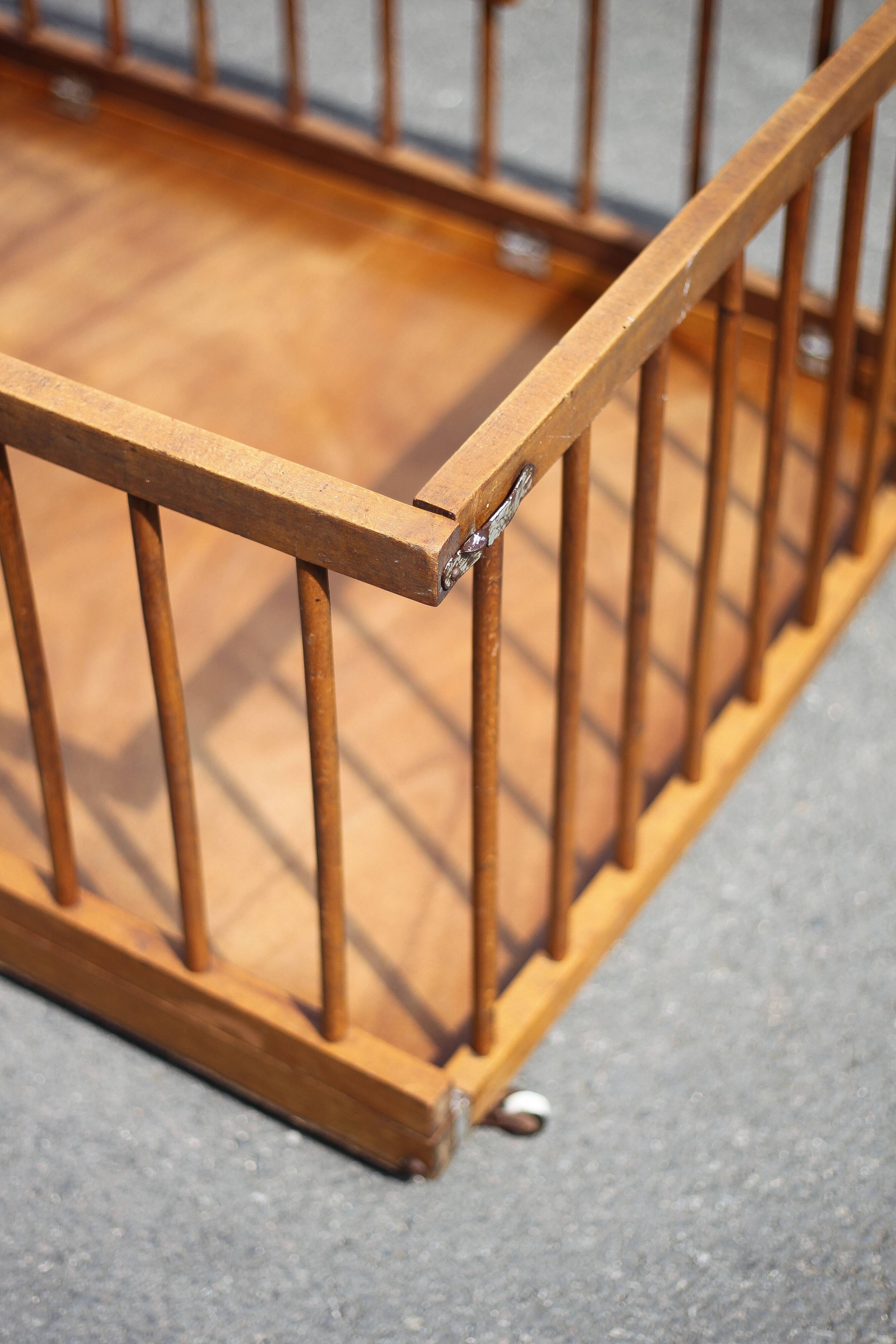 Folding wooden baby park on wheels, vintage park