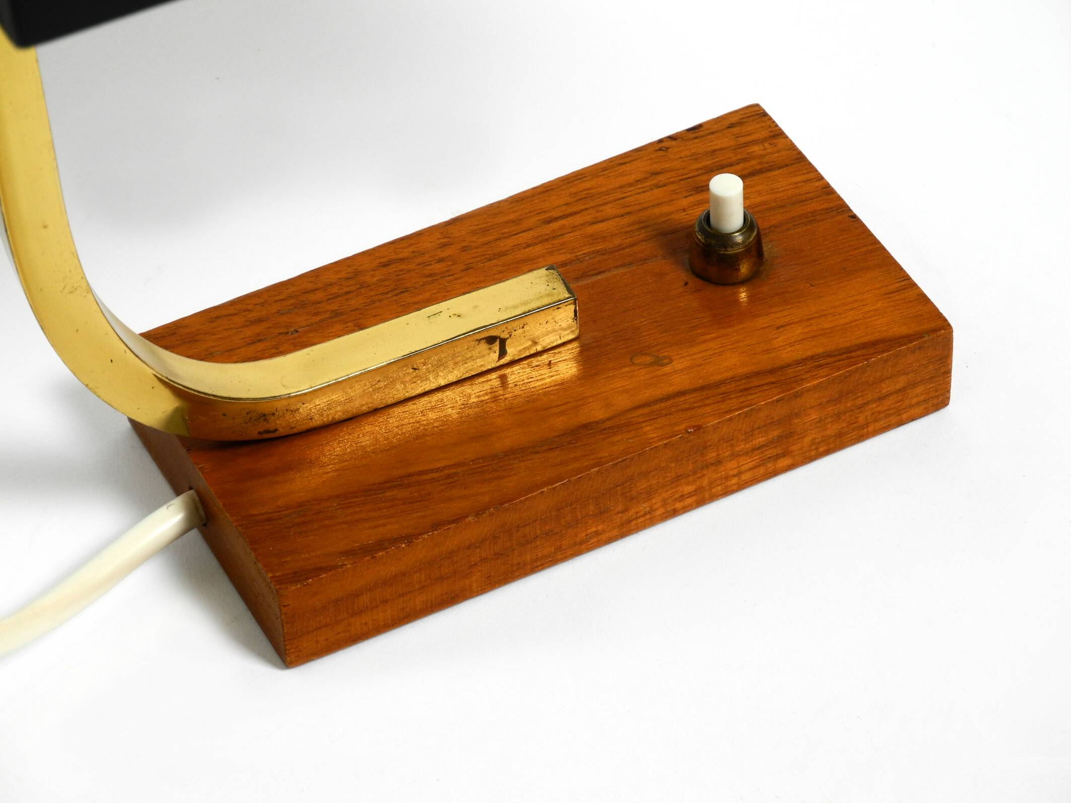 Beautiful small Mid Century Modern metal and brass table lamp with teak bas