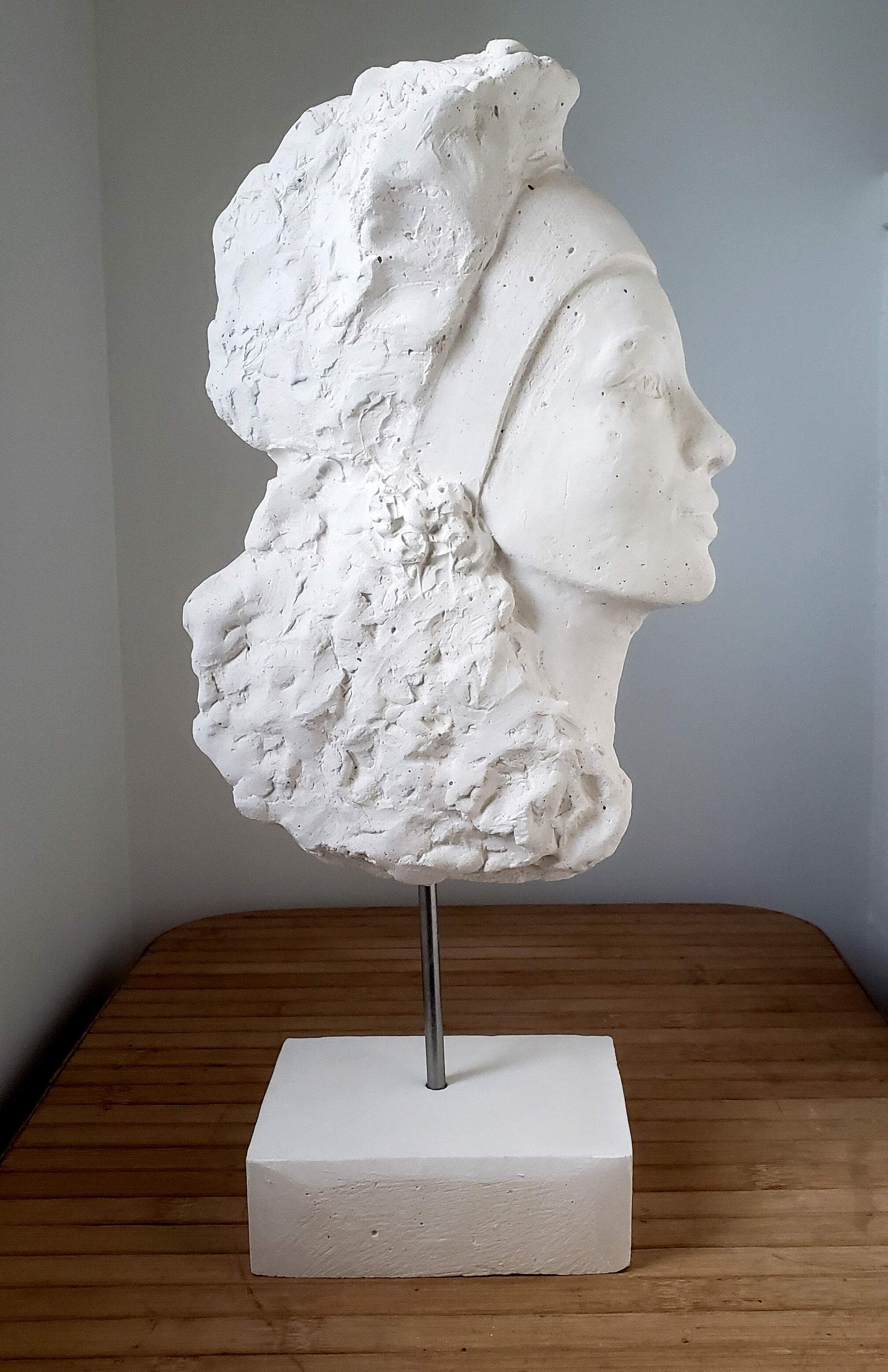 Young woman's head in plaster