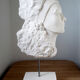 Young woman's head in plaster