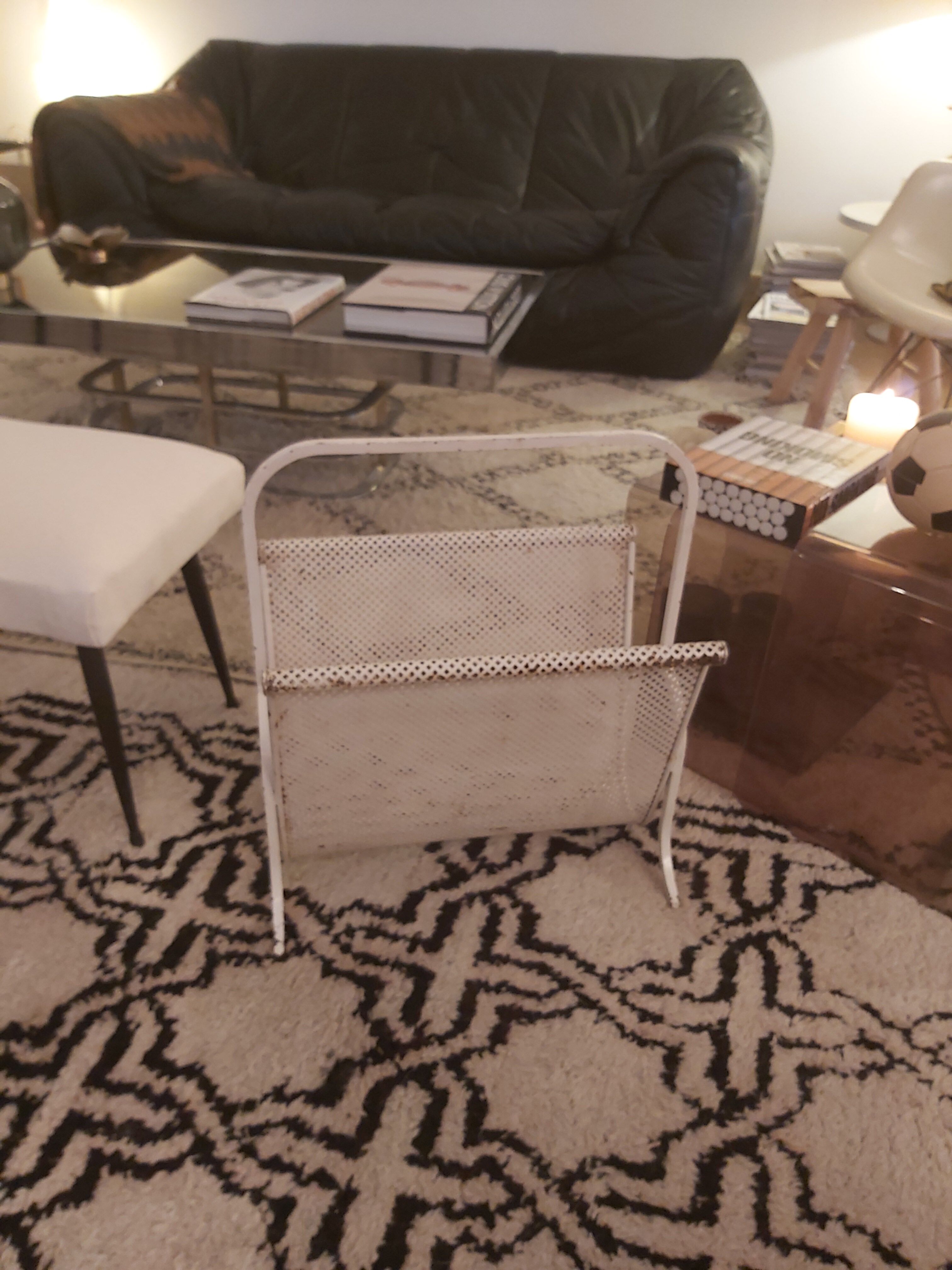 Vintage perforated metal magazine holder