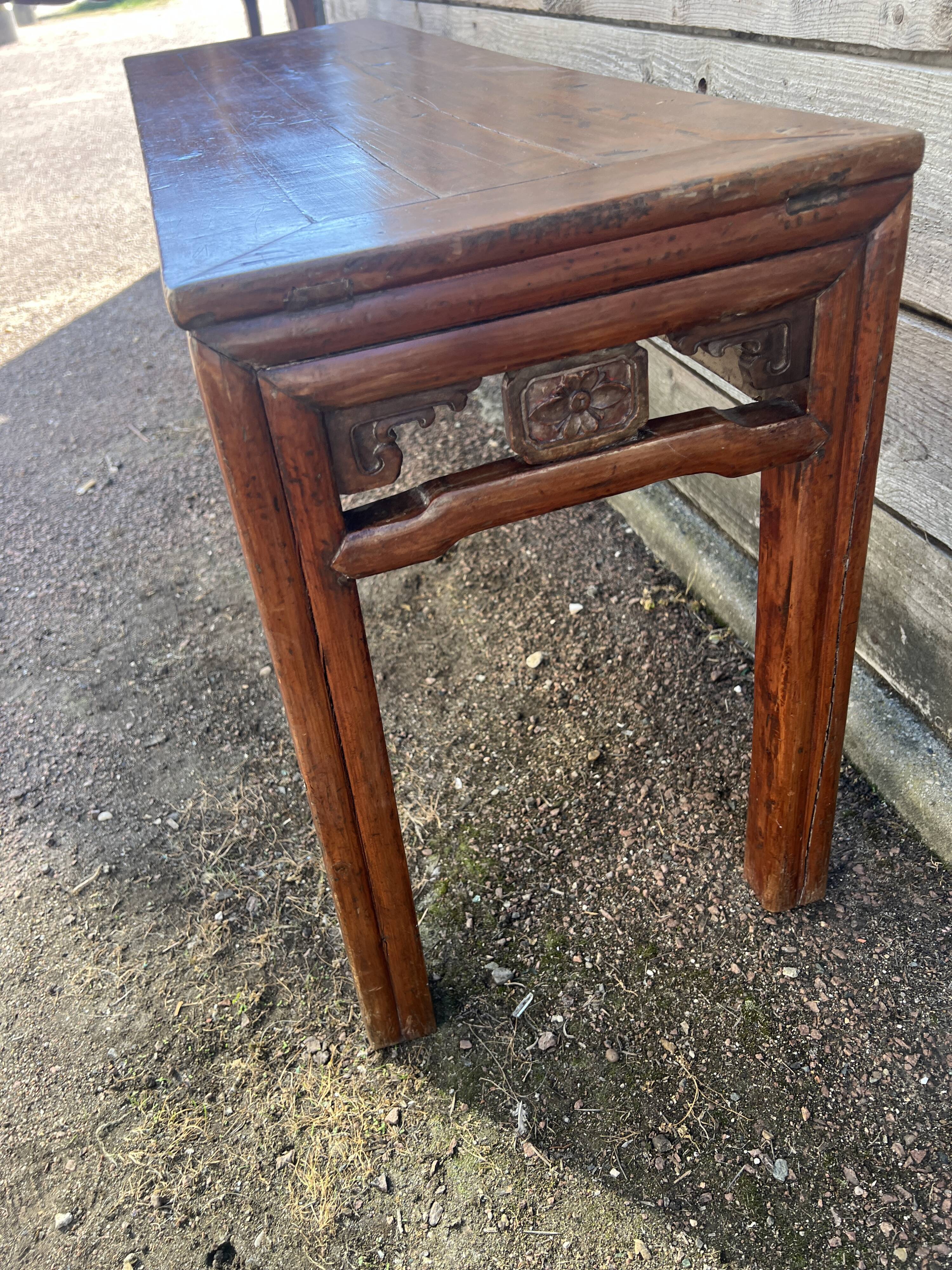 Asian low console in natural wood