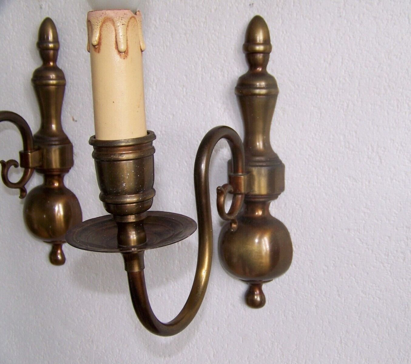 Pair of metal wall sconces
