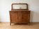 Antique sideboard in burl wood with marble and mirror.