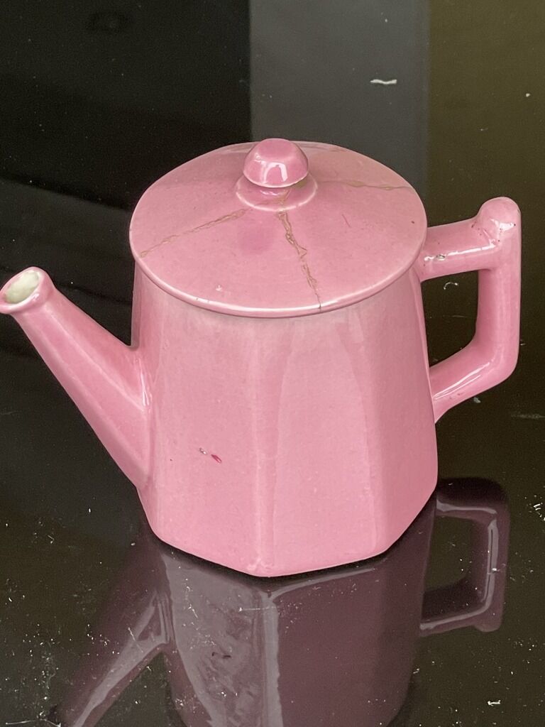 Former pink ceramic coffee maker