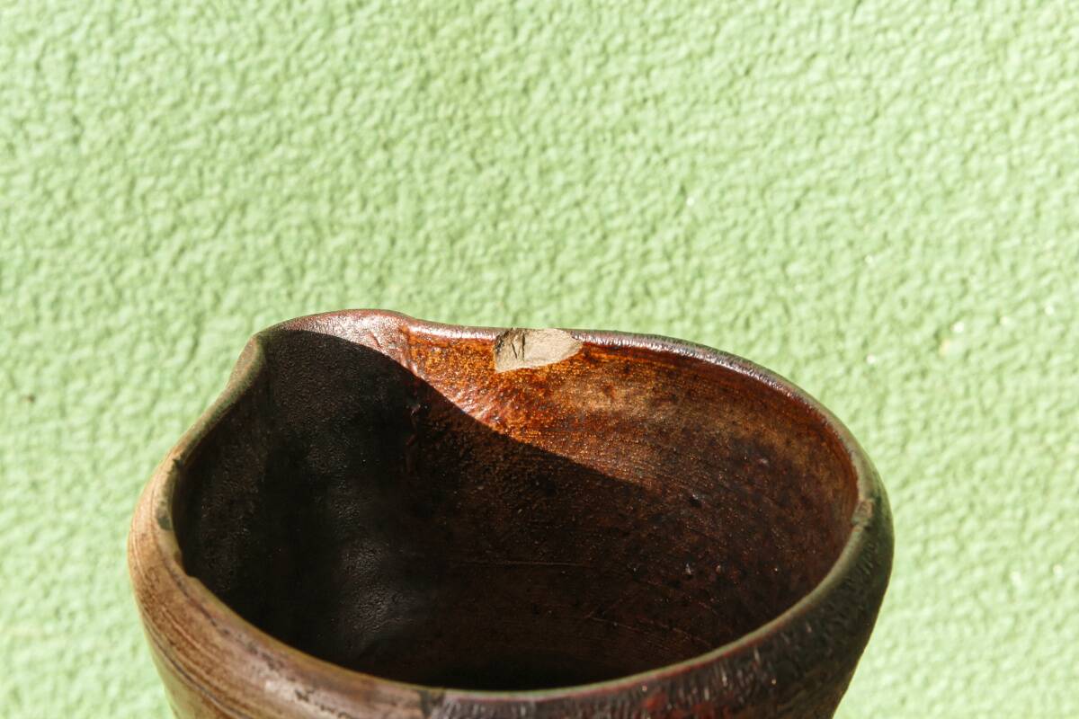 Large stoneware jug with a family name pattern, 1912