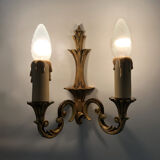 Old pair of wall sconces with double fires in bronze, seventies