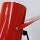 Pair of red metal wall lights