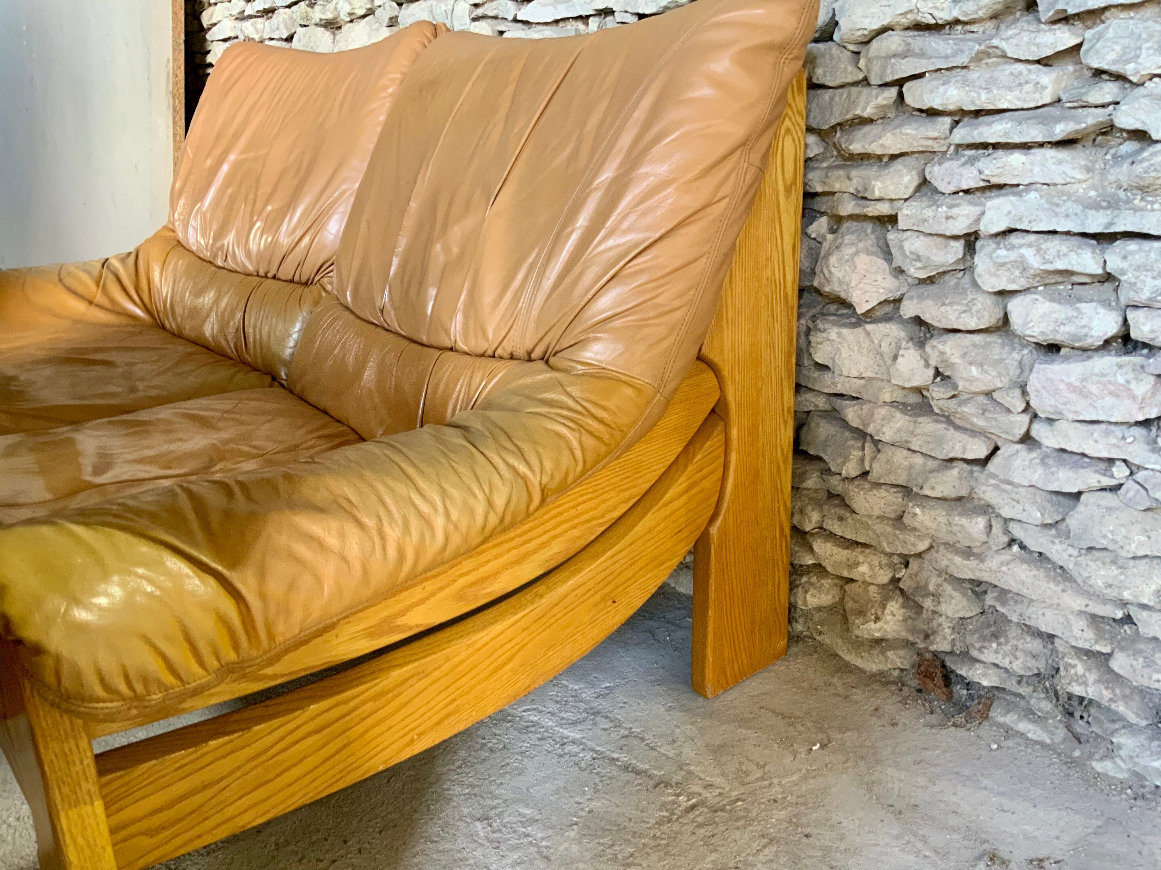 Leather and wood lounge of the Maison Regain 1950s/60s