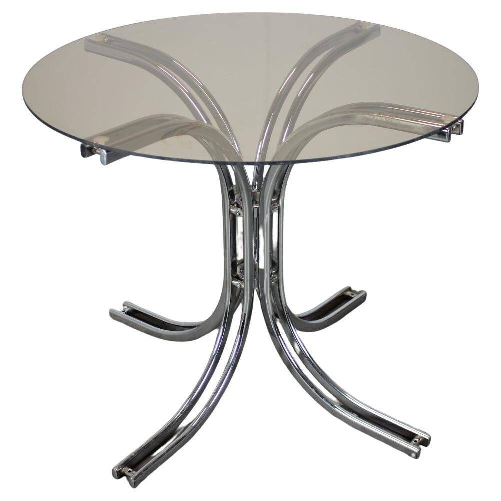 Round chrome and glass dining table / Italy, 1980s