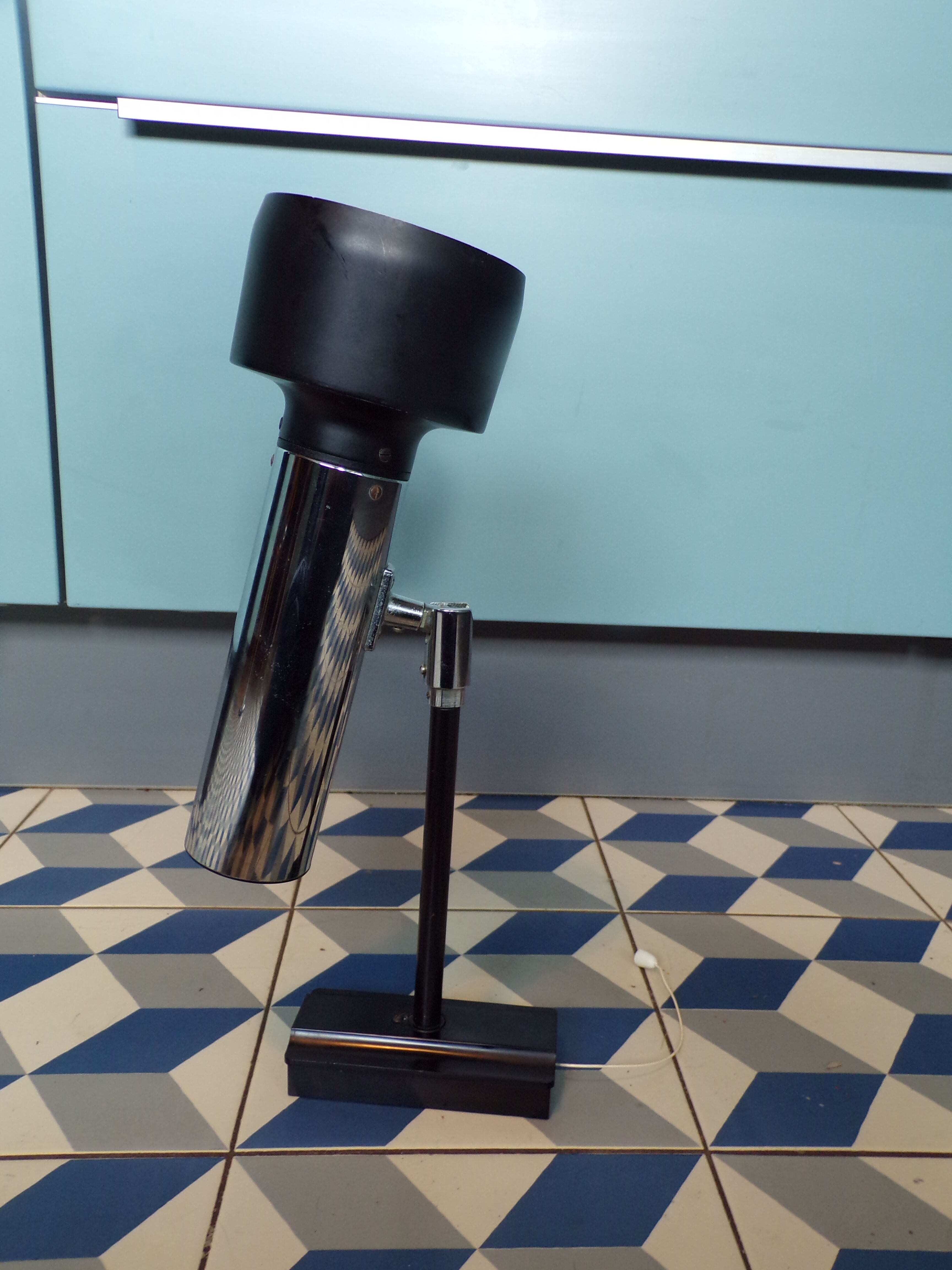 Space age articulated sconce