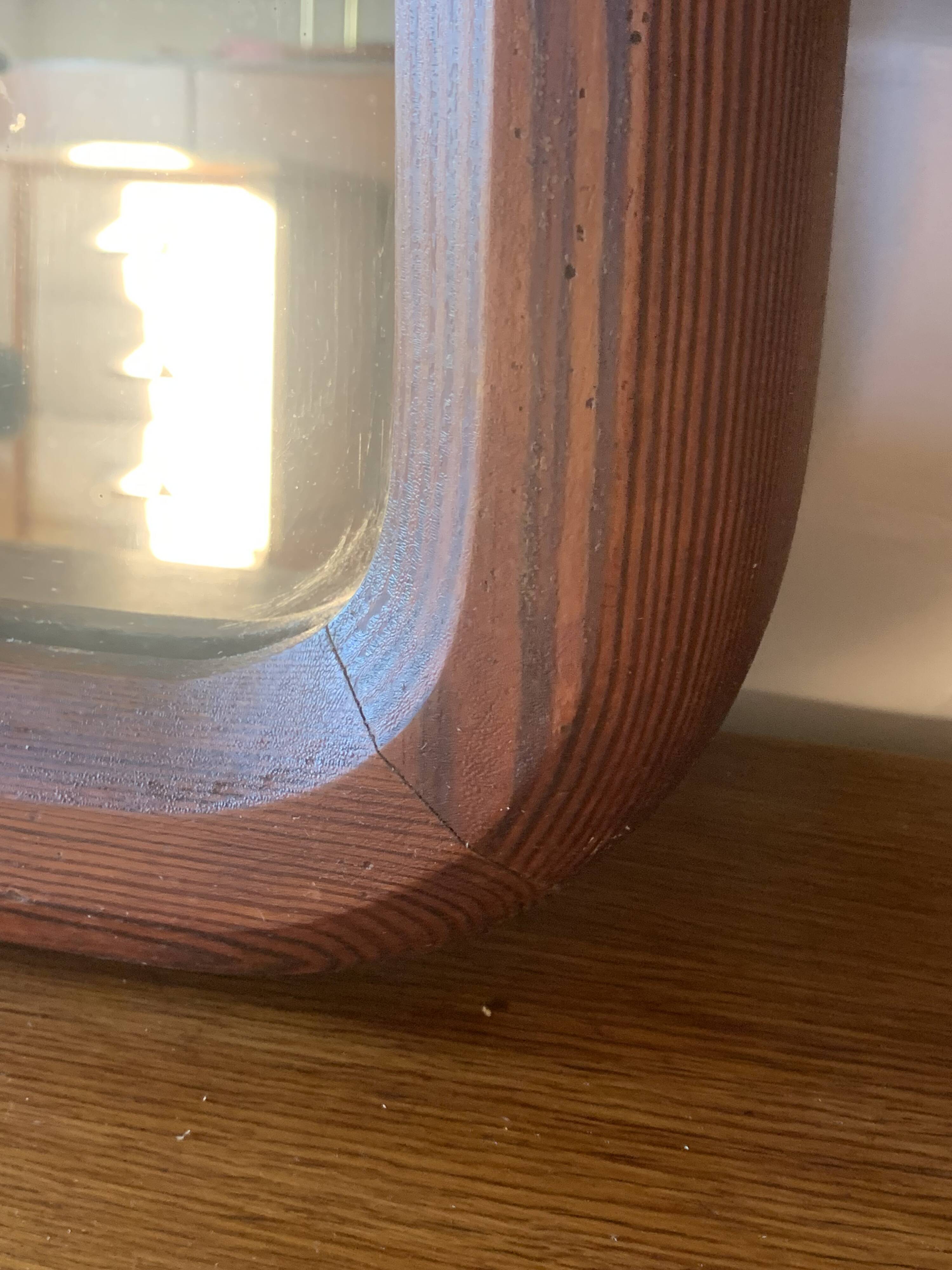 Old vintage wooden wall mirror