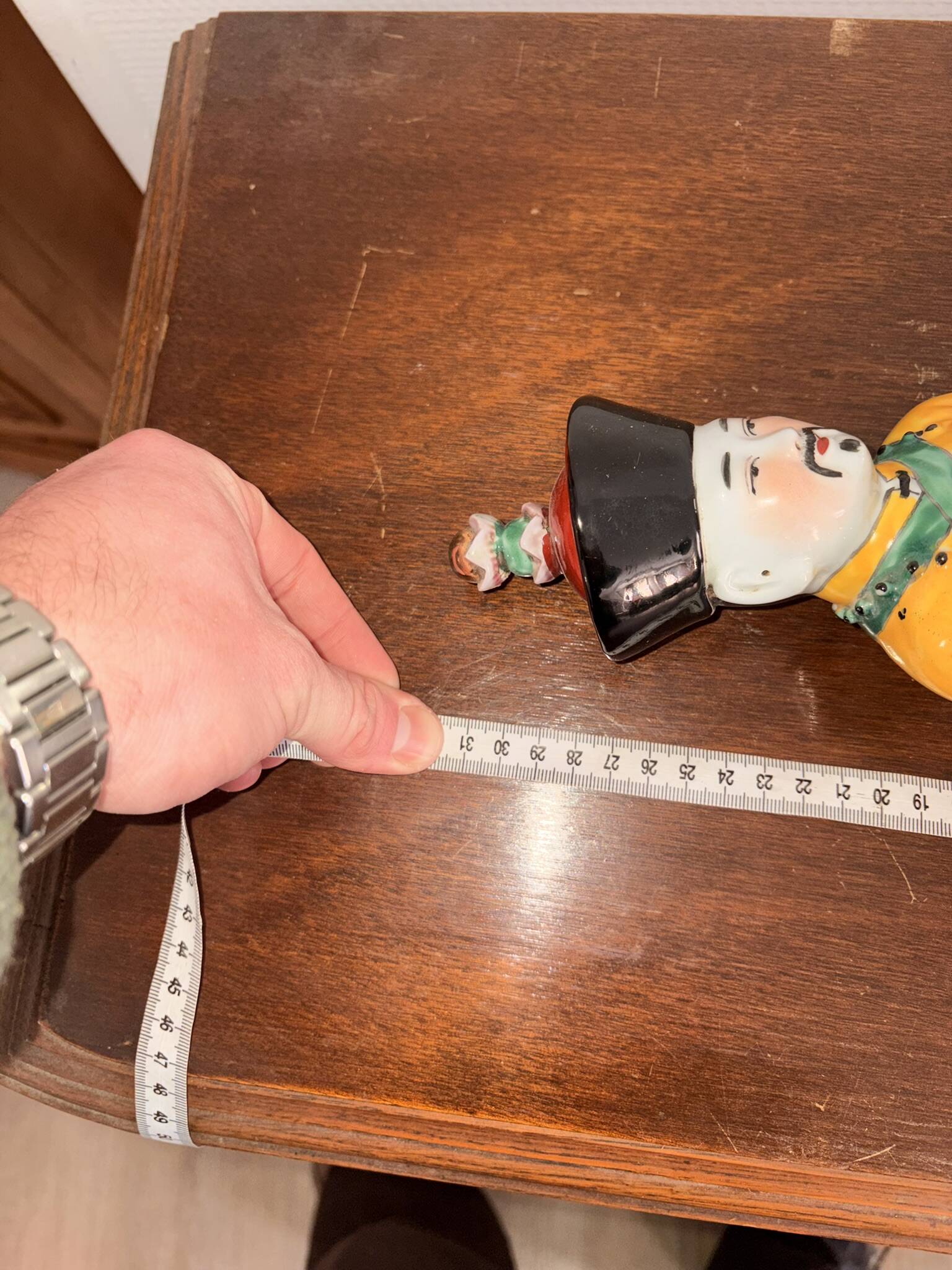 Chinese Porcelain Sculpture of an Emperor Dignitary from the Qing Dynasty, Famille Verte