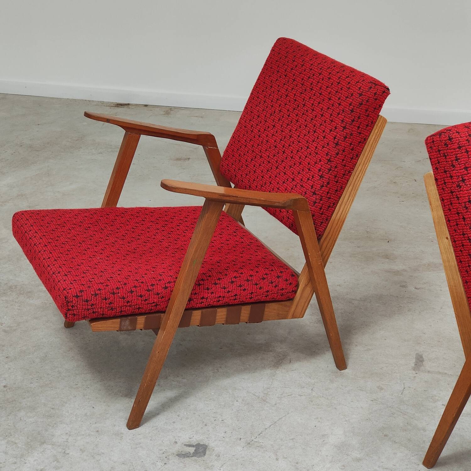 Pair of armchairs in mottled red and wood by Uluv, former Czechoslovakia 1960