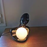 Vintage 80s lamp in the shape of a woman's bust made of black ceramic.