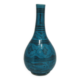 Vase en céramique islamique à fond turquoise