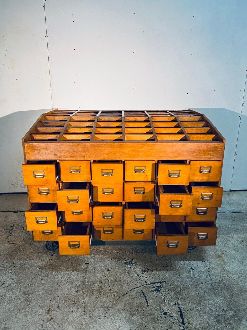 Double-sided wooden industrial filing cabinet with 48 vintage drawers