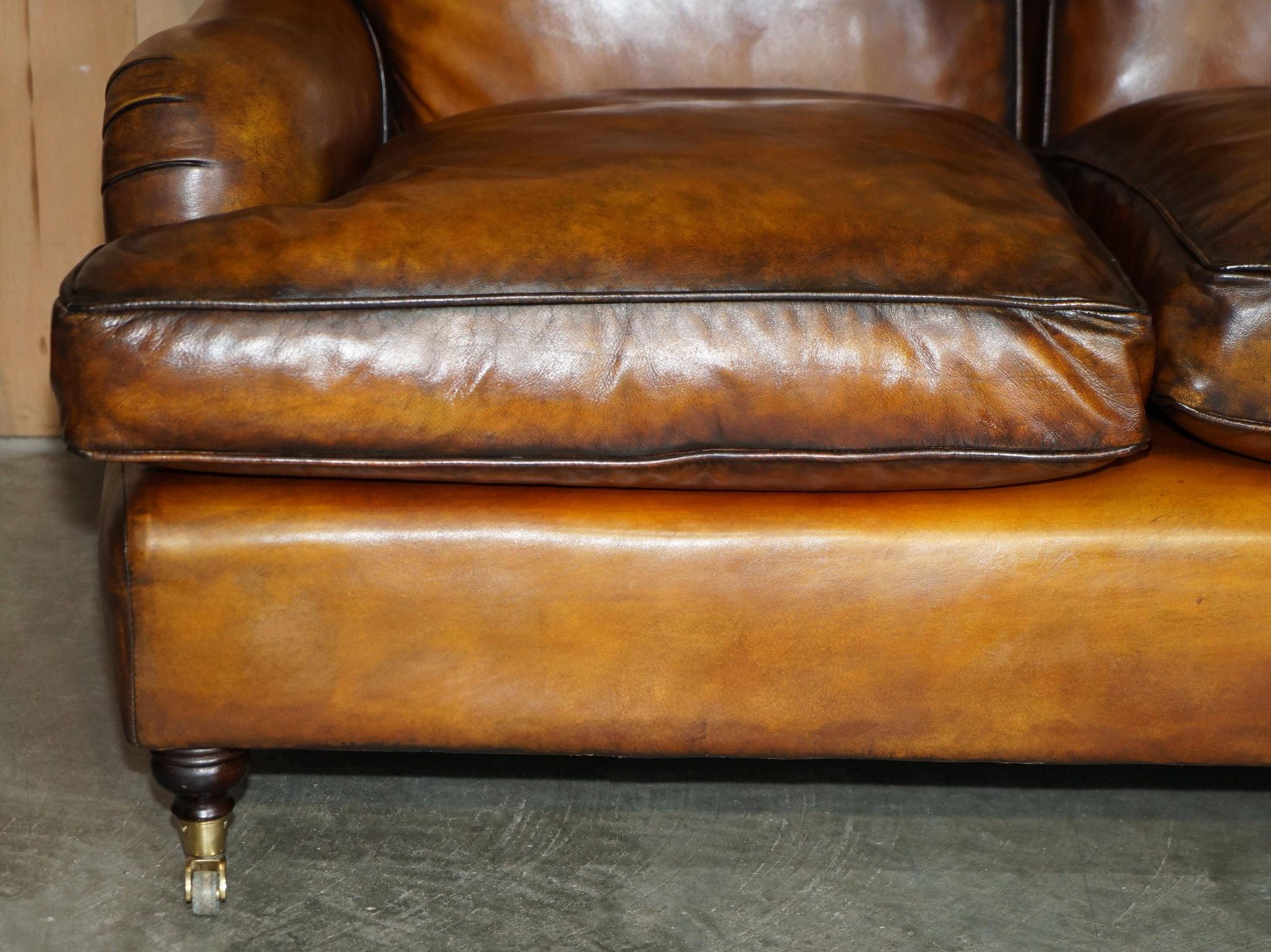 Howard & Son restored leather canapé, width 145 cm