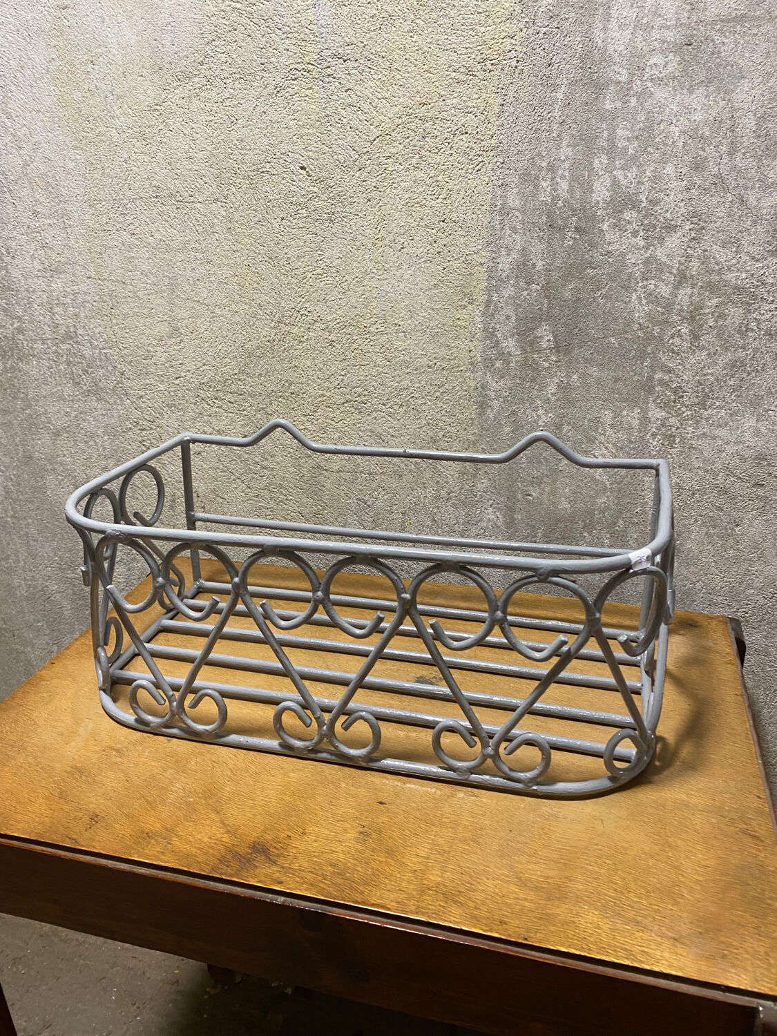 Gray wrought iron shelf
