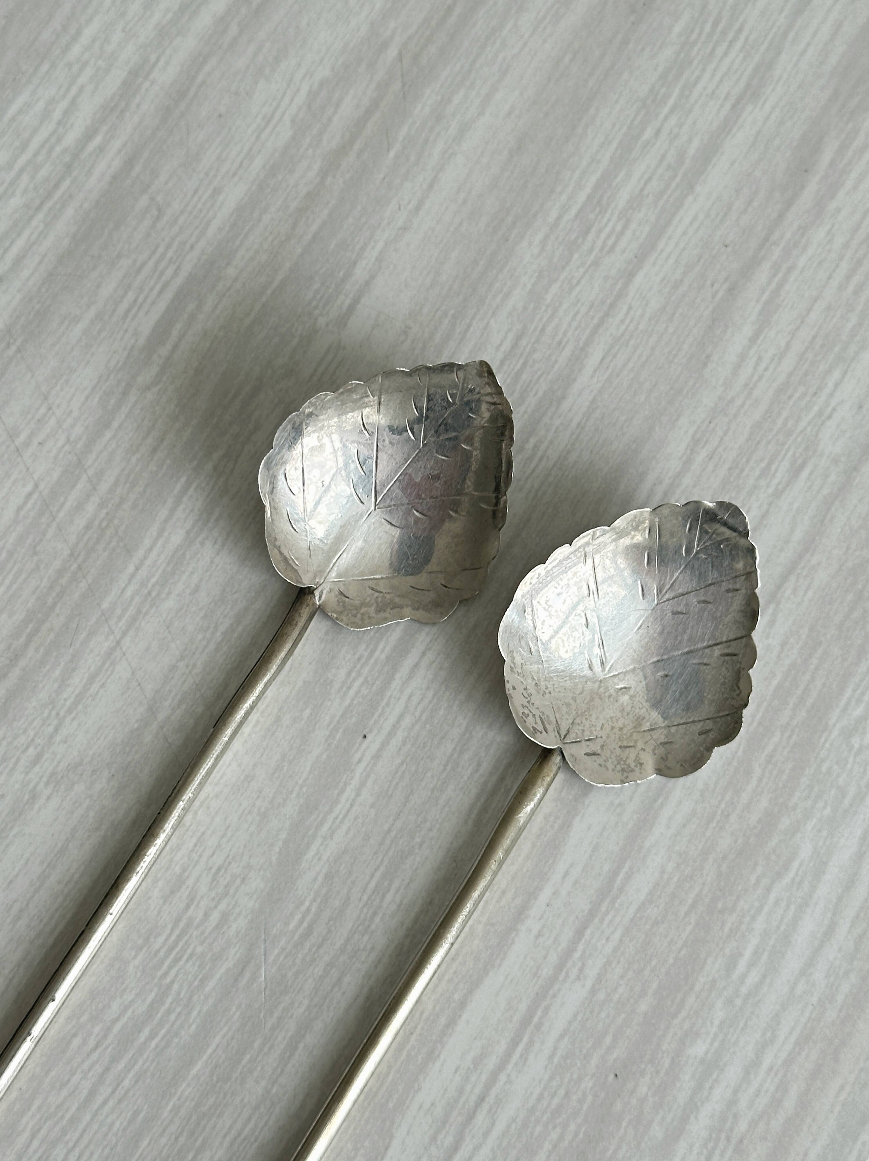Pair of vintage silver leaf mixers