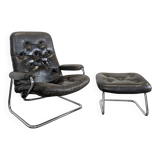 Stressless armchair and ottoman in leather from the 1970s.