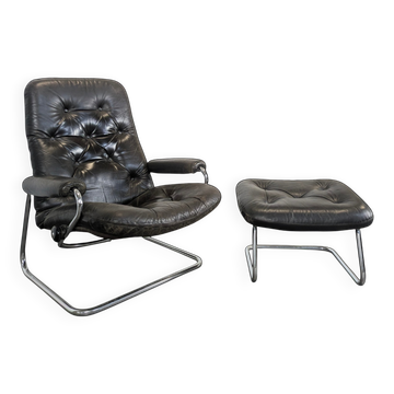Stressless armchair and ottoman in leather from the 1970s.