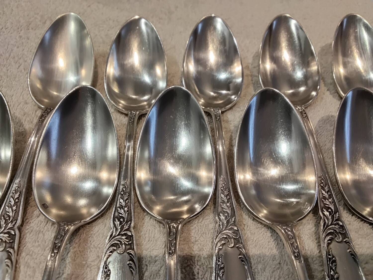 12 silver-plated metal dessert spoons, silversmith SFAM, rocaille design, 19.1 cm.