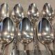 12 silver-plated metal dessert spoons, silversmith SFAM, rocaille design, 19.1 cm.