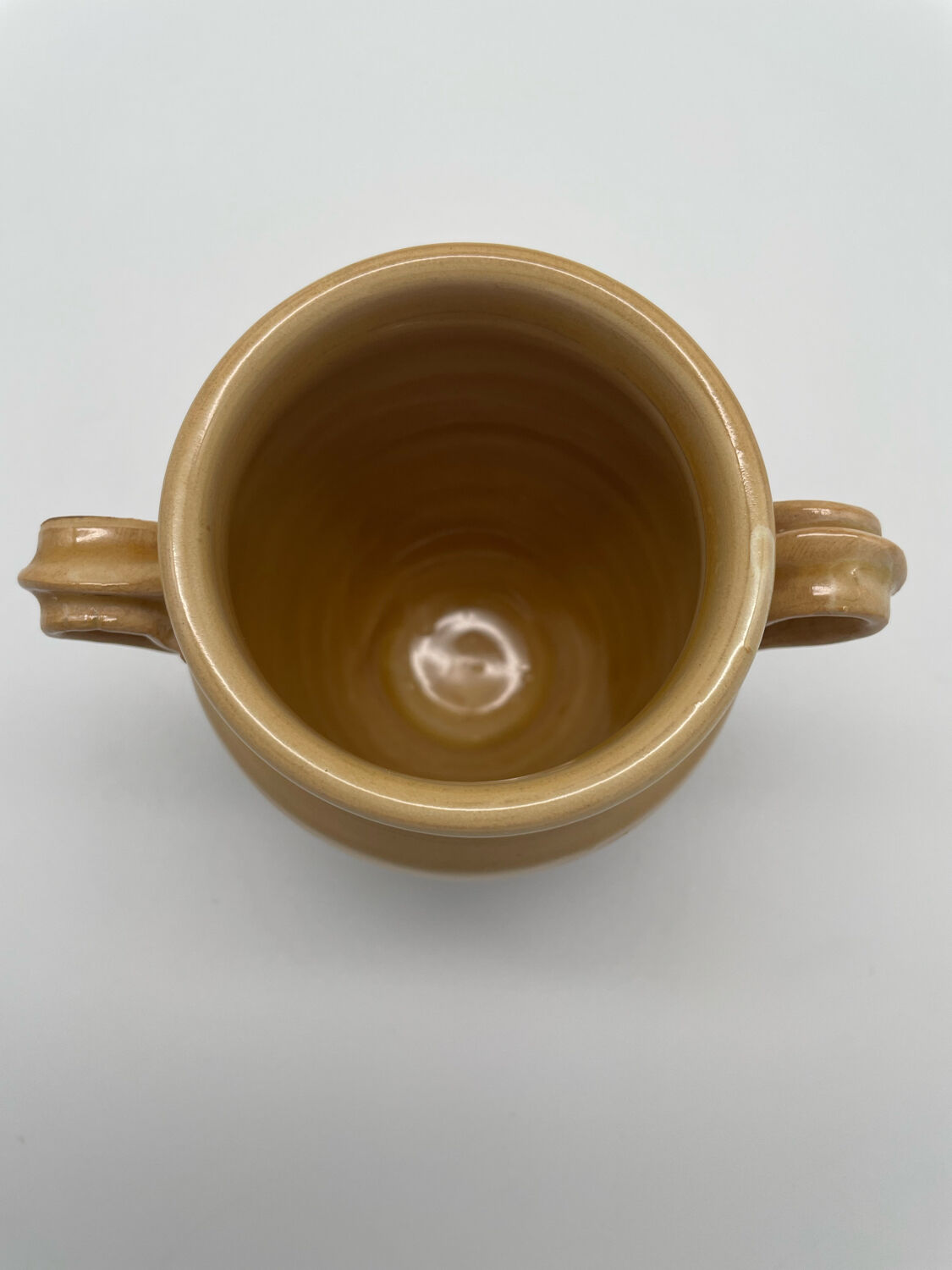 Varnished yellow terracotta confit pot