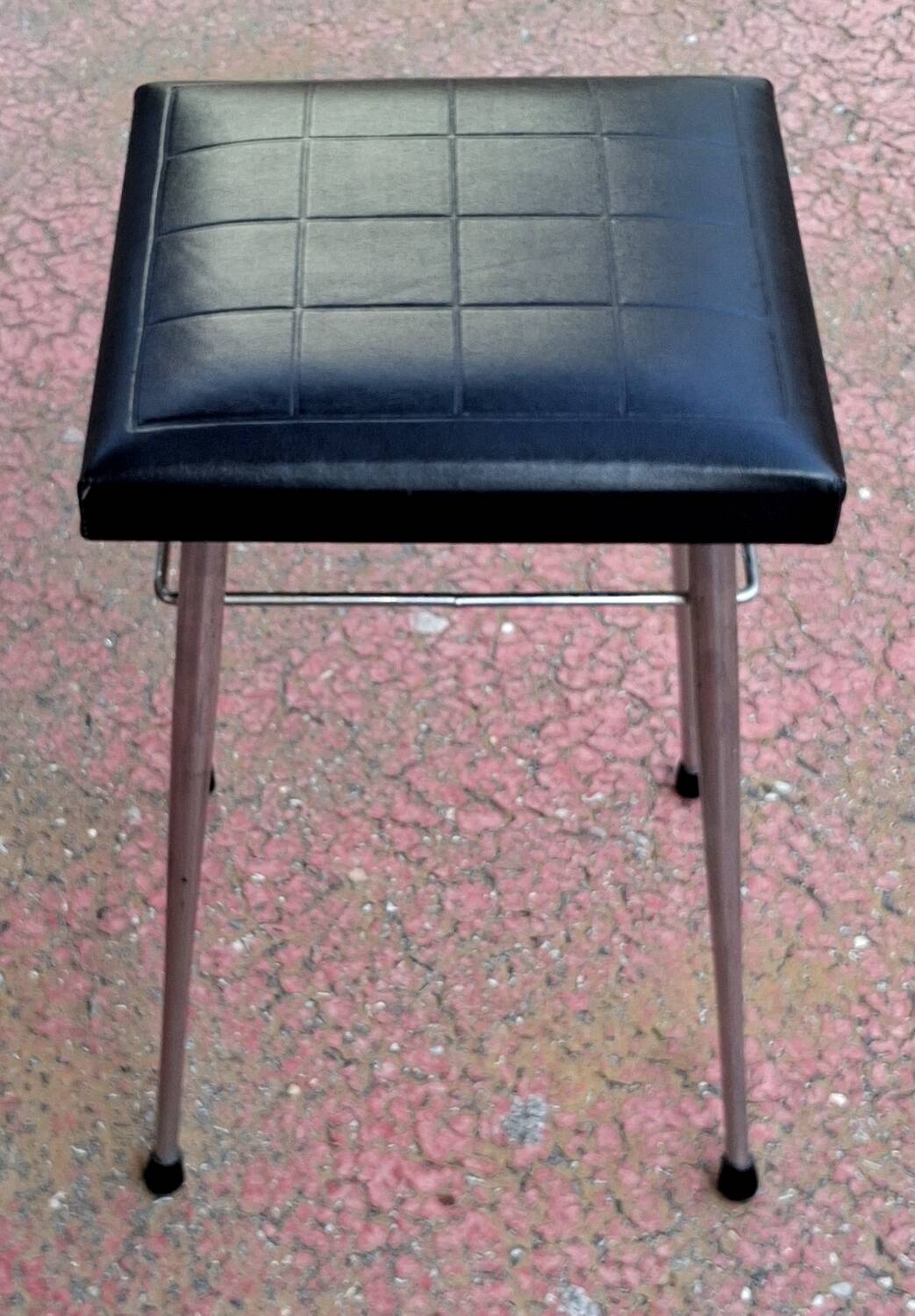 Black faux leather and chrome stool. 1970s, vintage seventies decor.