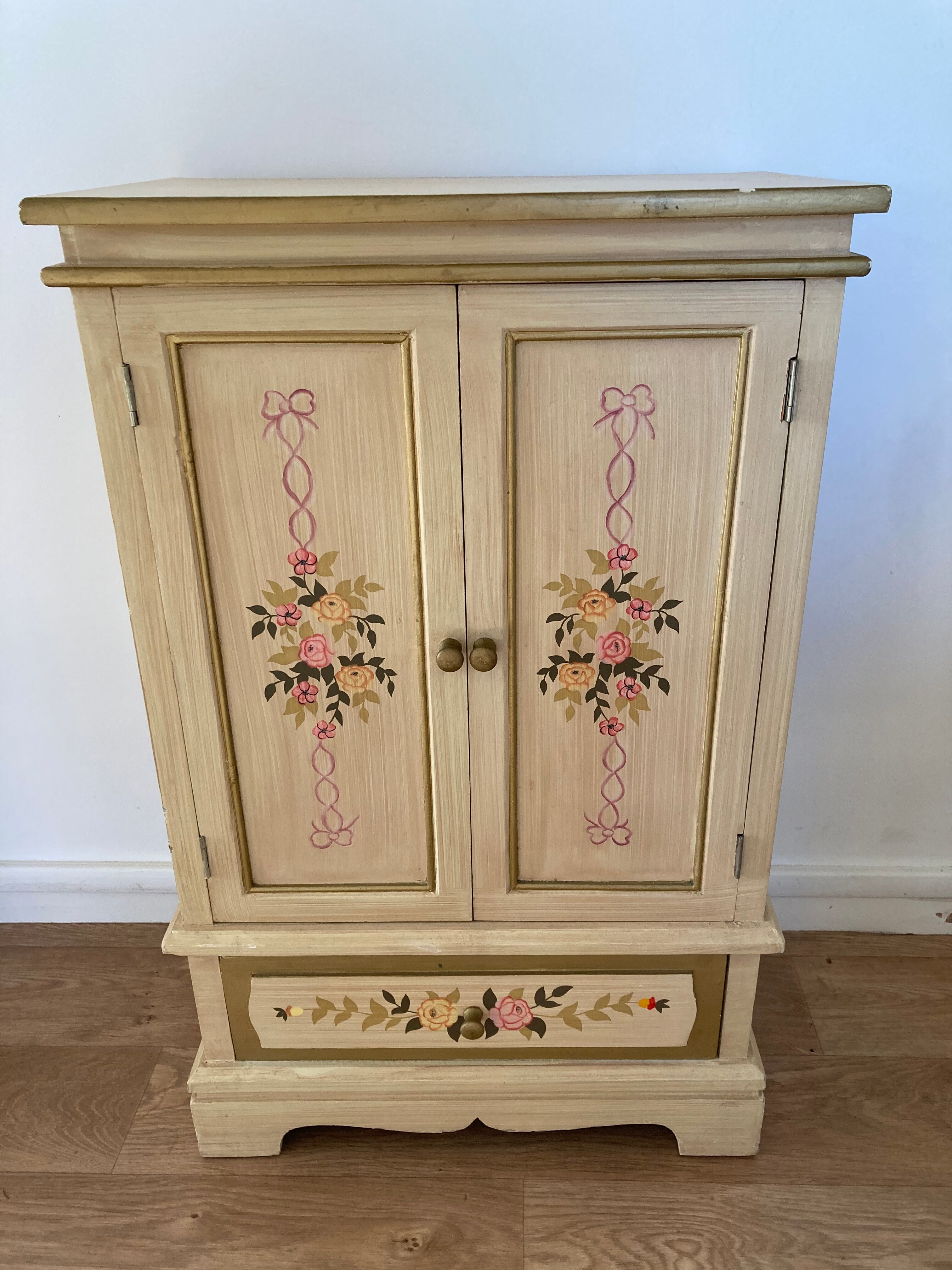 2-door flowered wooden cabinet