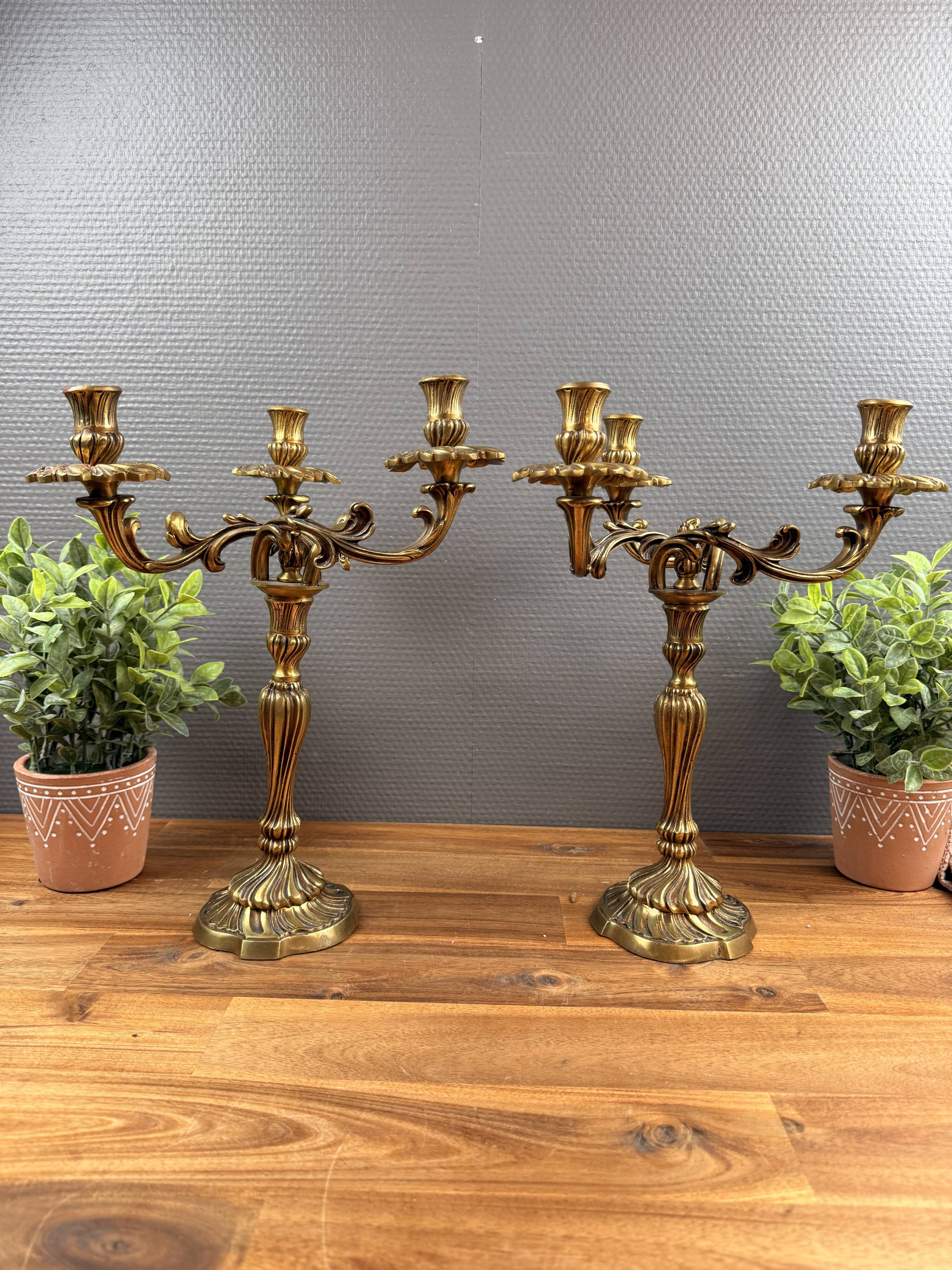 Pair of antique bronze candlesticks, Louis XV style