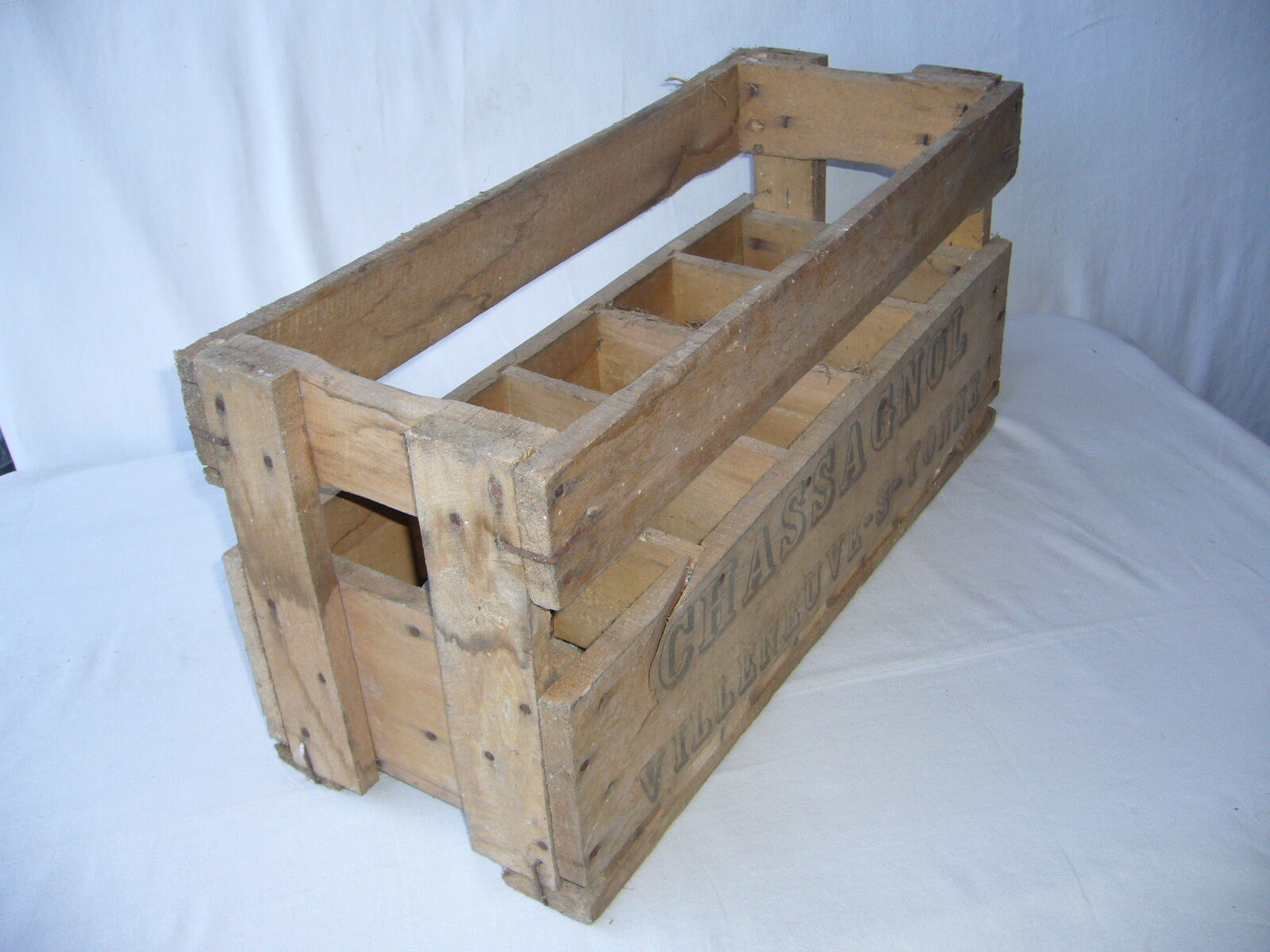 Old wooden crate for milk bottles