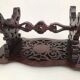 Repose pied en bois sculpté vintage
