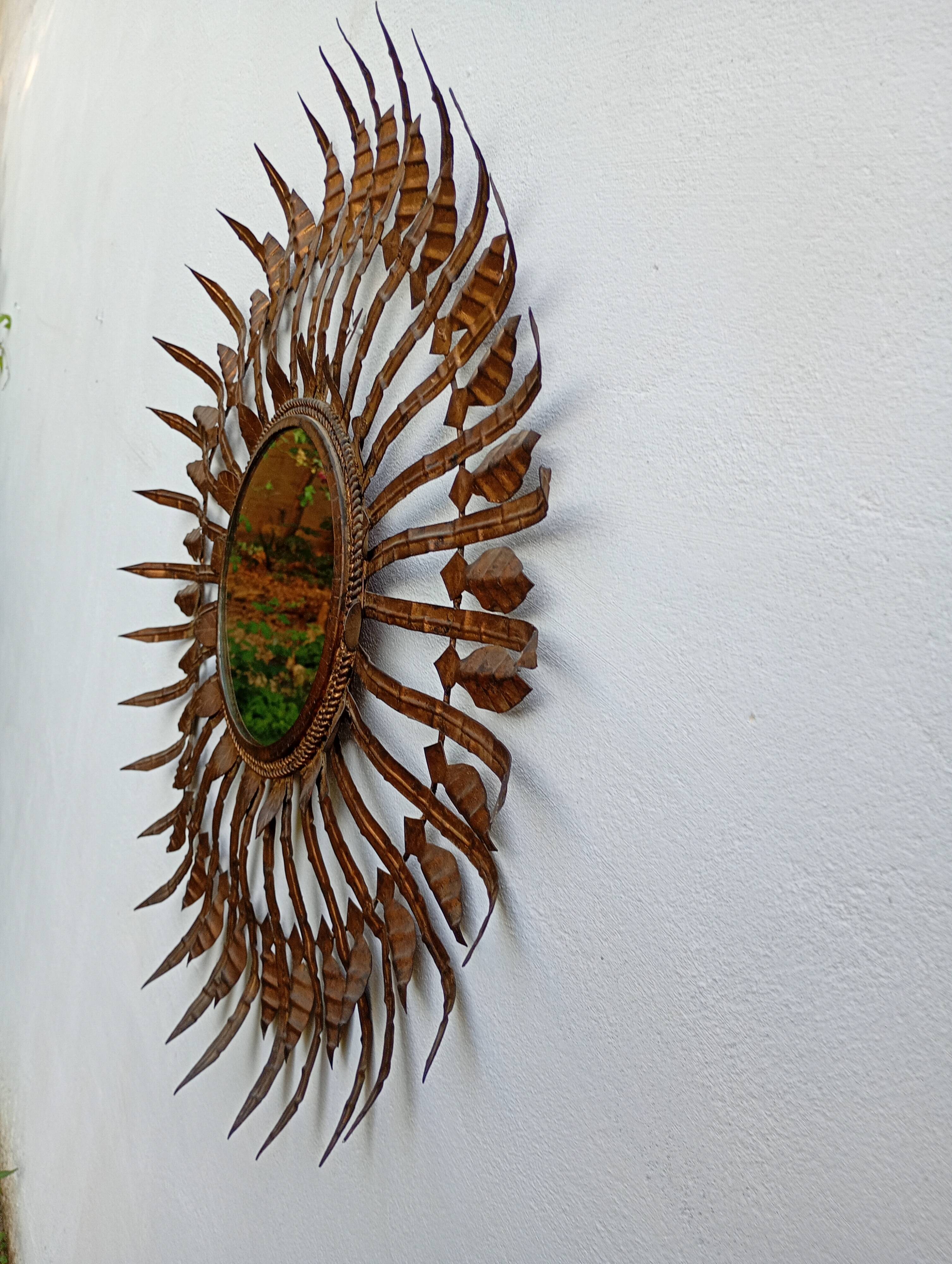 Vintage sun mirror in patinated gold metal – Spain 1950s / 60s