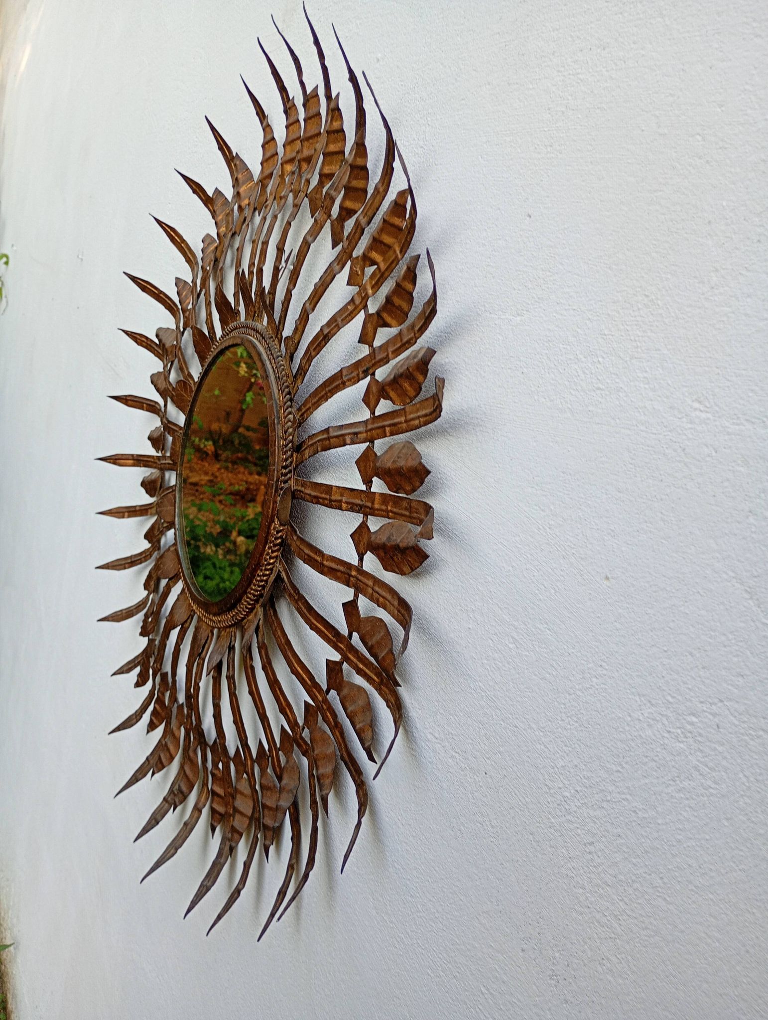 Vintage sun mirror in patinated gold metal – Spain 1950s / 60s