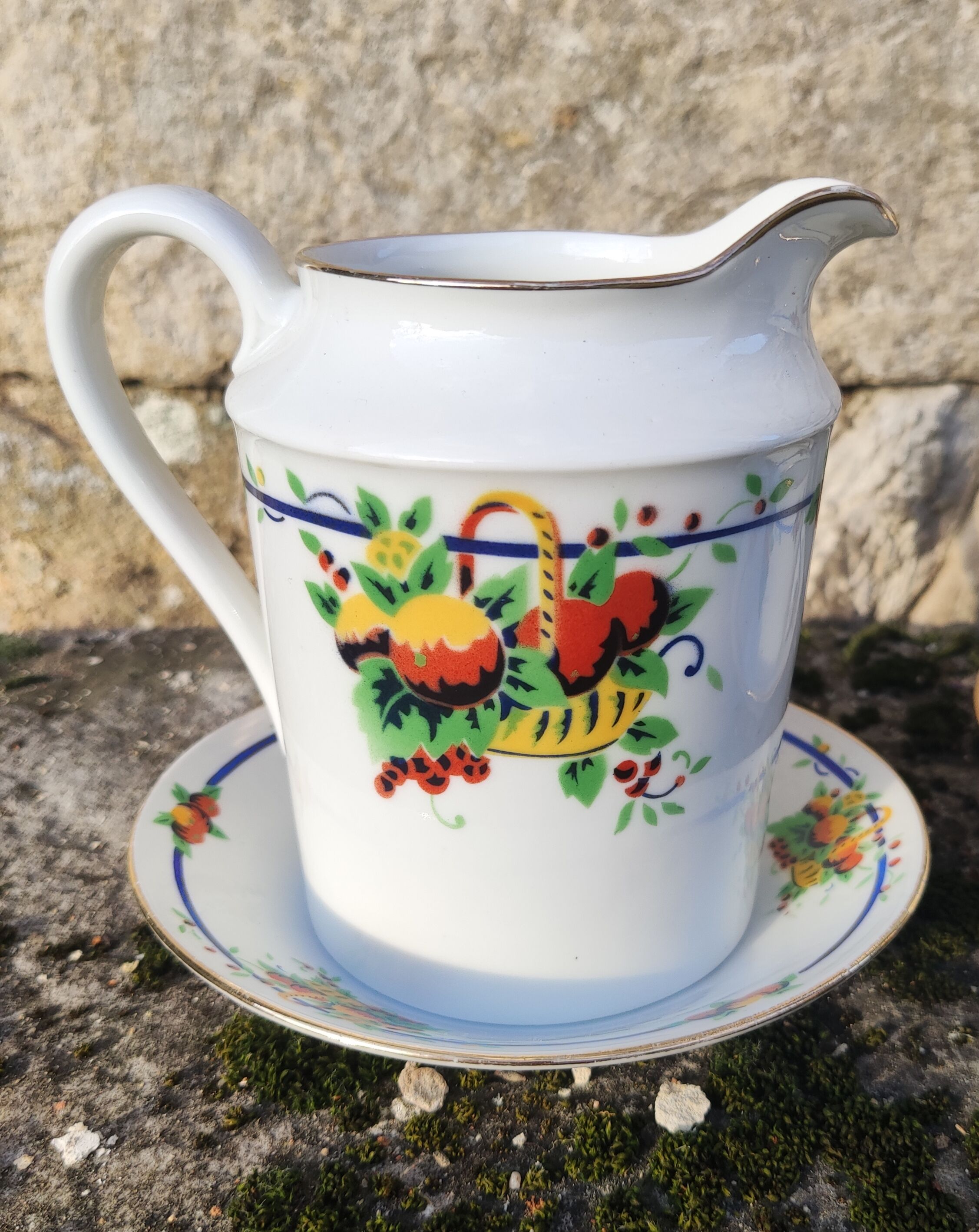 10 tea cups and creamer in Limoges porcelain