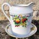 10 tea cups and creamer in Limoges porcelain