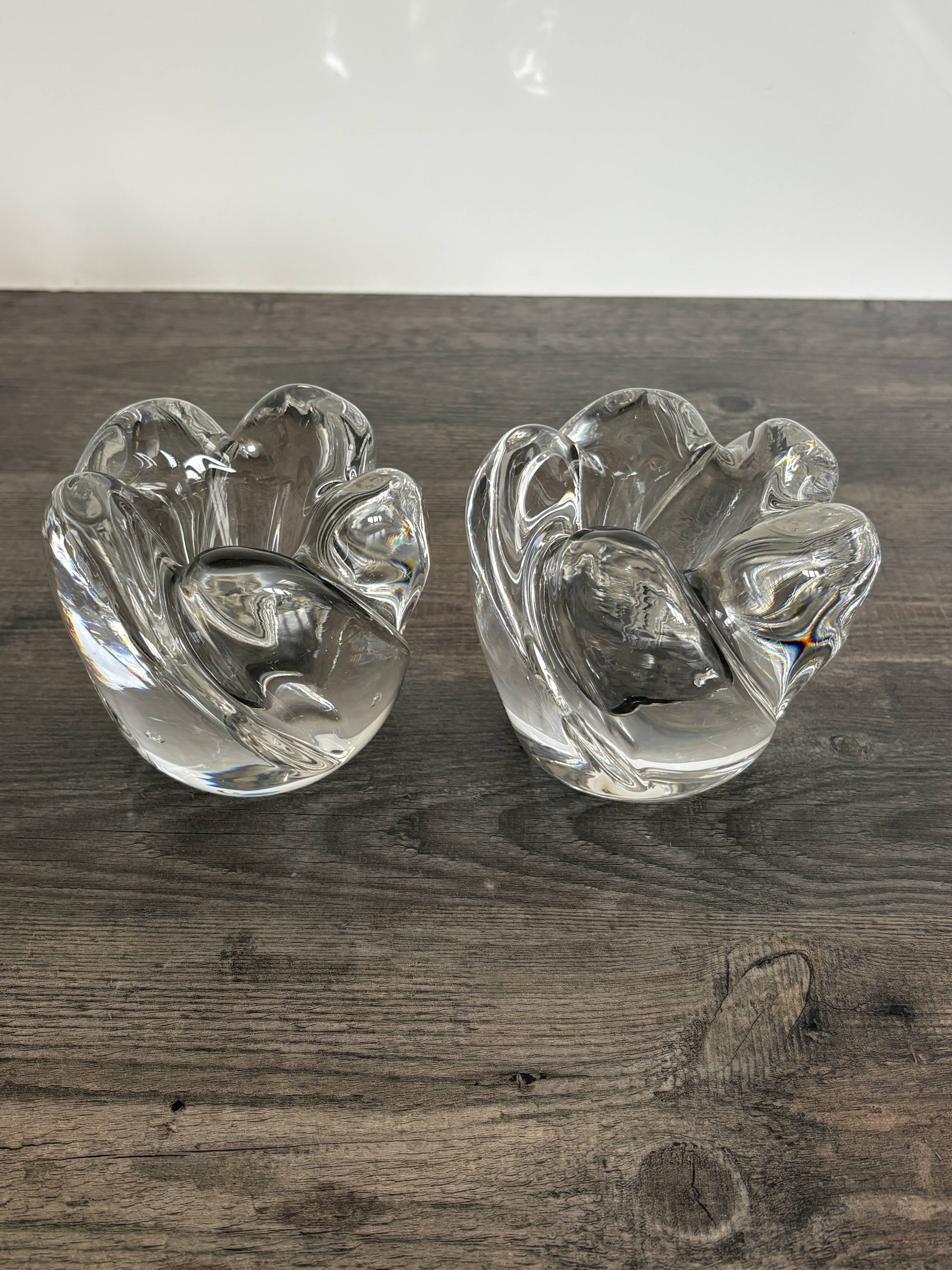 Pair of rose crystal candle holders by Daum France