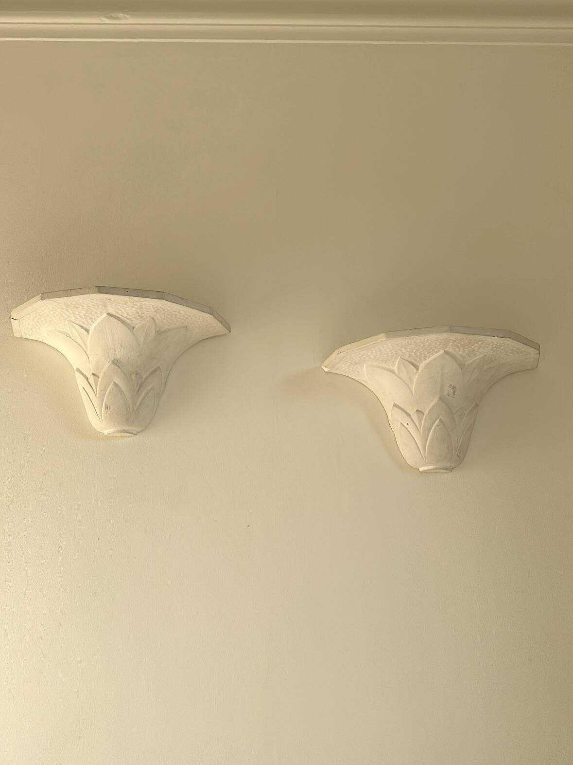Pair of plaster wall sconces, palmette decoration, 20th century