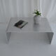 Table basse en aluminium brossé sculptural