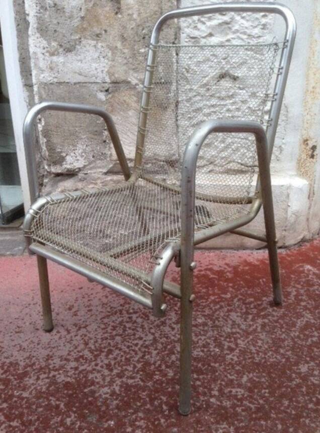 Vintage armchair in ribbed fabric and chrome steel from the 1940s France