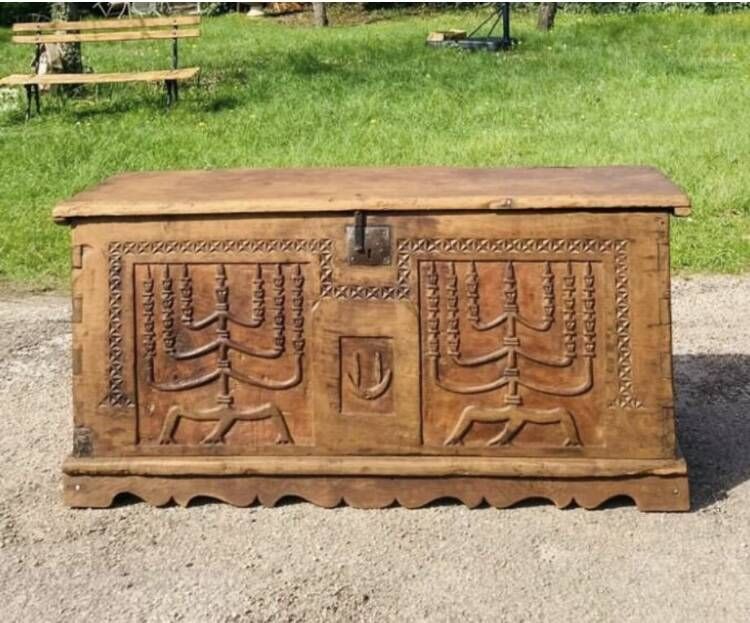 wedding chest in solid fruit wood carved with 2 Menorahs and Hebrew symbol from the 18th century or even before.