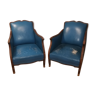 Paire de fauteuils vintage en skai